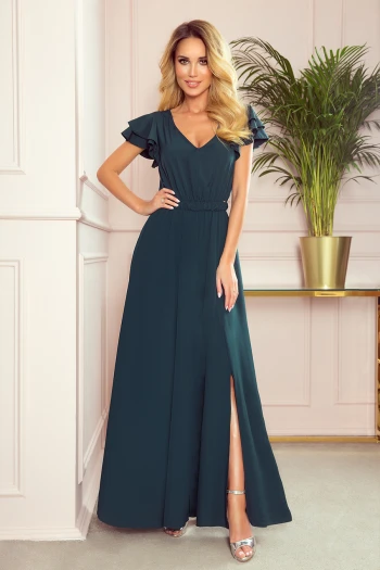 The woman in the photo is wearing a stylish pink pleated dress, highlighting its elegant design and soft fabric. This pleated dress is perfect for both casual outings and formal events, offering a versatile addition to any wardrobe.