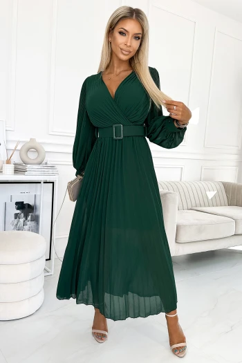 The woman in the photo is wearing a chic denim dress, highlighting its elegant fit and stylish zipper details. This denim dress offers a sophisticated look perfect for both casual and formal occasions.