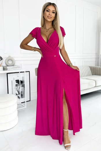 The woman in the photo is wearing a stunning floral maxi dress adorned with vibrant pink roses. The dress features a flattering wrap design, perfect for showcasing the elegance of the floral maxi dress.