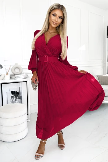 The woman in the photo is wearing a stunning satin wrap dress, showcasing its elegant silhouette and soft sheen. This satin wrap dress is perfect for adding a touch of glamour to any occasion.