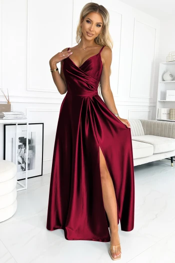 The woman in the photo is wearing a stylish leopard print wrap dress, showcasing its elegant design and flattering fit. This chic animal print dress is perfect for making a bold fashion statement.