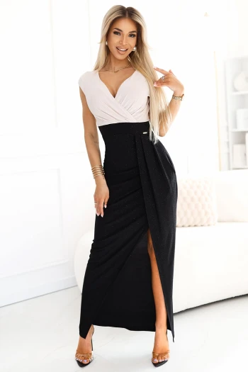 The woman in the photo is wearing a stylish mint green button-up dress with a waist tie, perfect for casual outings. This chic dress features rolled-up sleeves and pocket details, adding a touch of elegance to the ensemble.