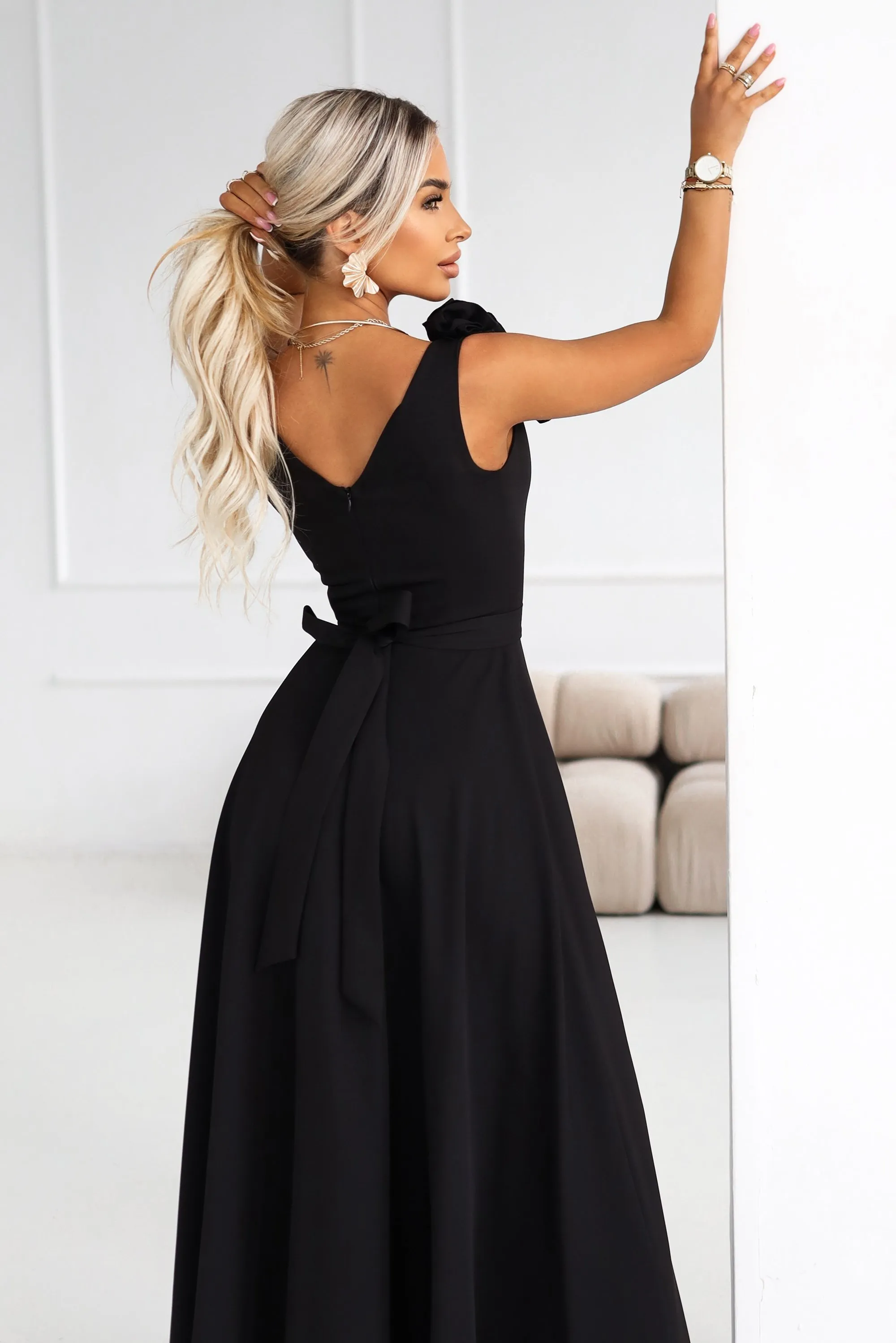 643-2 Elegant maxi evening dress with a slit and roses - classic black